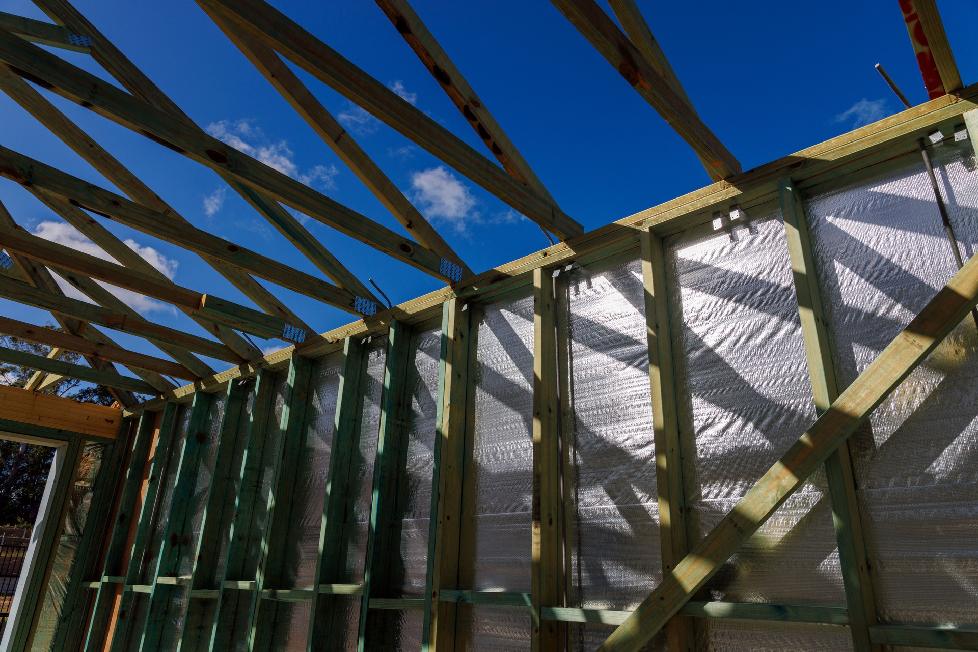 Housing Construction. Internal Timber Frame. Reflective Wall Insulation.